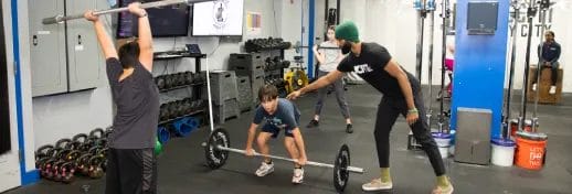 JCFit Kids lifting Barbells